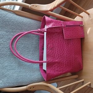 Pink tote purse with detachable zipper wallet with attached key chain inside